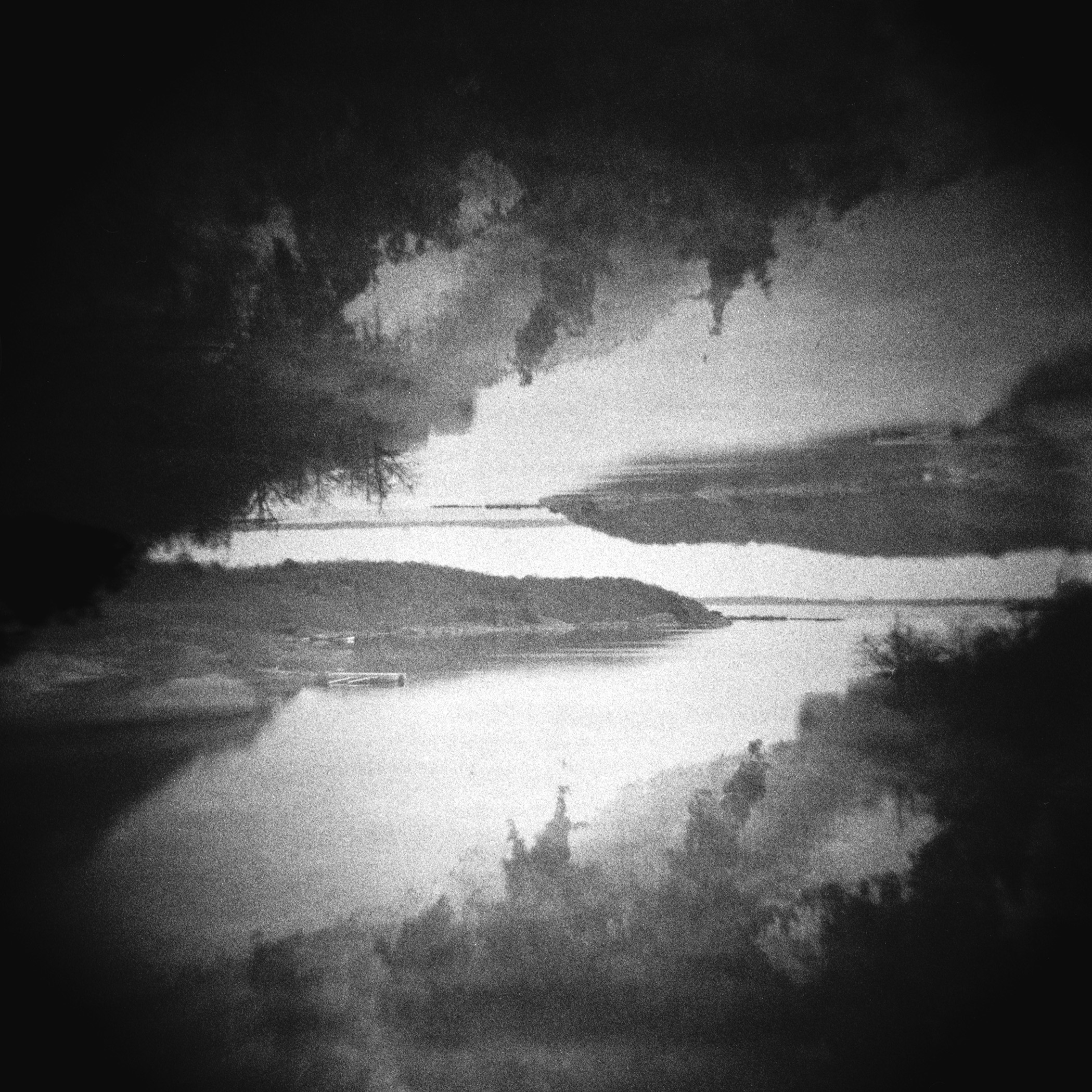 Adjacencies — black and white in-camera double exposure of a wooded Swedish coastline mirrored upside down, Blekinge, Sweden.